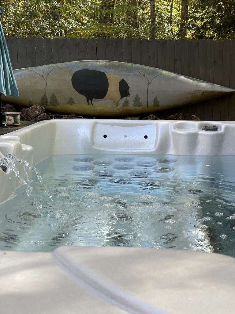 View of 6 person, sparkling clear hot tub.